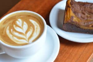 Cappuccino and lemon pound cake in Red Rooster's Black Water Loft