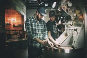 Photo of Christopher Roberts and James Noel at Oak Cliff Coffee Roasters