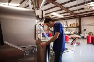 Photo of Trey Cobb, co-founder and roaster at Greater Goods Coffee Roasters