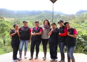 Photo of Elisa Madriñan (center), co-founder of of La Palma Y El Tucán with her all-women crew of elite pickers