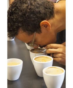 Photo of Martin Trejo, of Amavida Coffee, at the cupping table