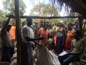 Photo of weighing at Gesha Village Farm. 