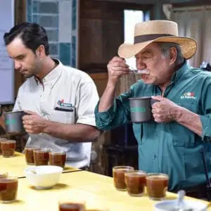 Photo of Arturo Aguirre, Jr. and Sr., cupping their Guatemala coffees