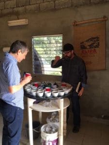 Equator's Ted Stachura cupping with Wilford Lamastus