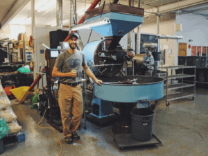 Brady Guinn, of Novo Coffee, in the company's Denver roastery. 