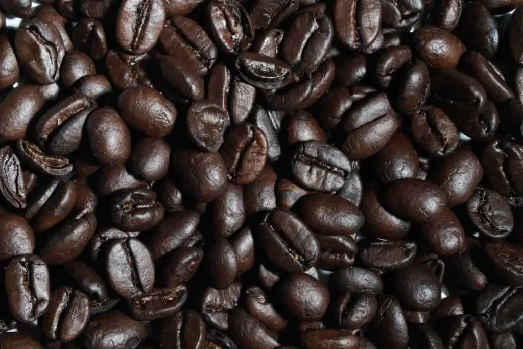 Close up photo of darker roasted coffee beans